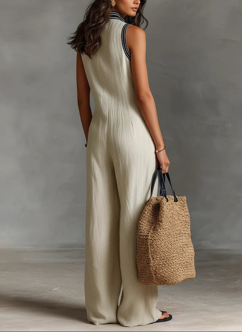 Gaia | Tuta beige smanicata con scollo profondo e gamba larga