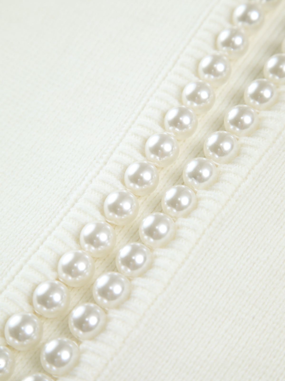Cardigan elegante Amaraine adornato di perle