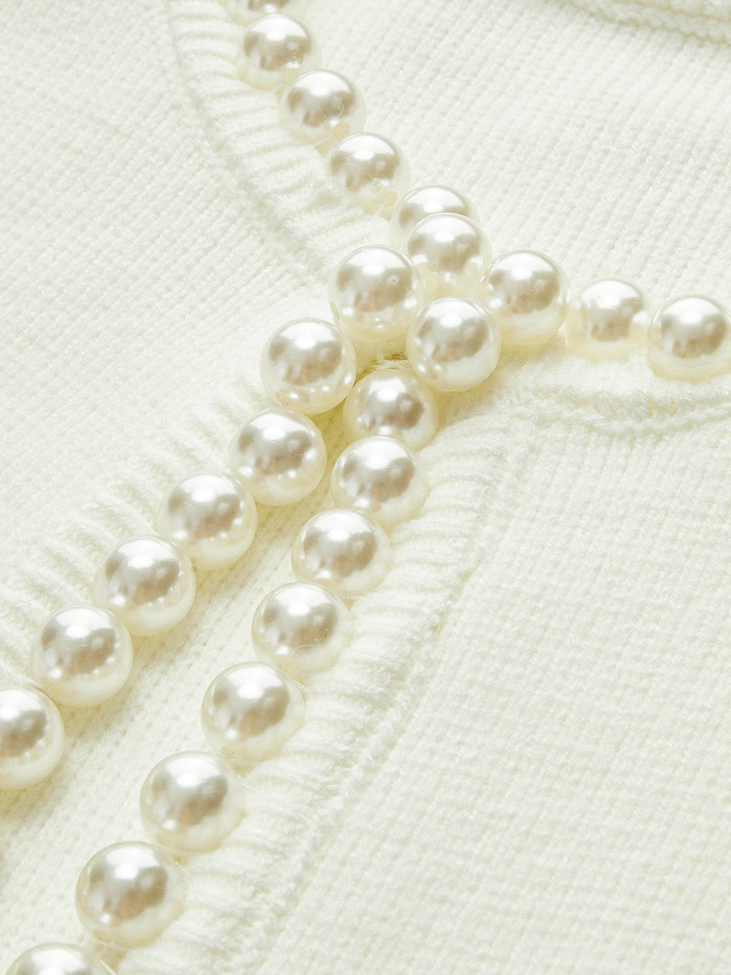 Cardigan elegante Amaraine adornato di perle