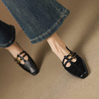 Etta | Mules a doppia fascia con brogue
