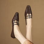 Etta | Mules a doppia fascia con brogue