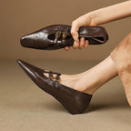Etta | Mules a doppia fascia con brogue