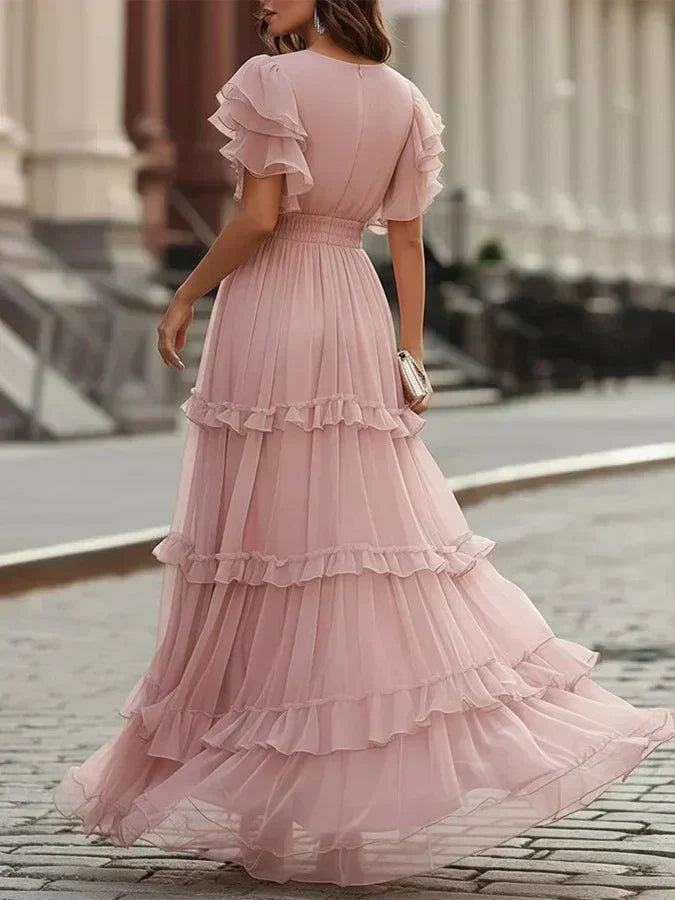Rosalía | Vestito Maxi Rosa Polveroso con Scollatura a V, Volant a Strati e Maniche a Farfalla