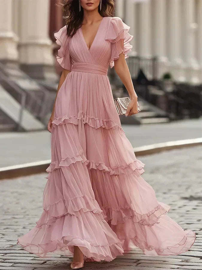 Rosalía | Vestito Maxi Rosa Polveroso con Scollatura a V, Volant a Strati e Maniche a Farfalla