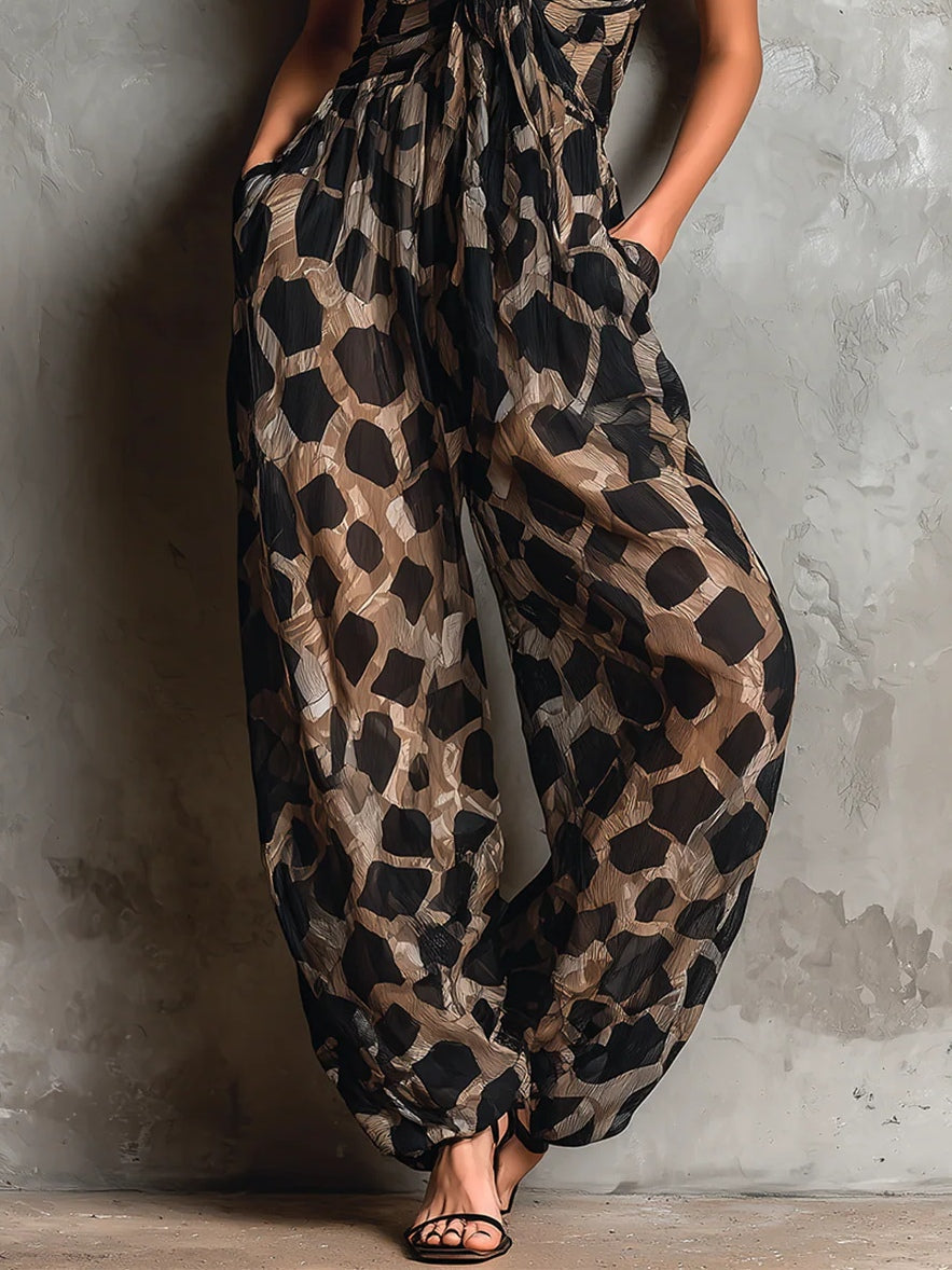 Zaira | Tuta leopardata con scollo a V, spalline sottili e nodo in vita